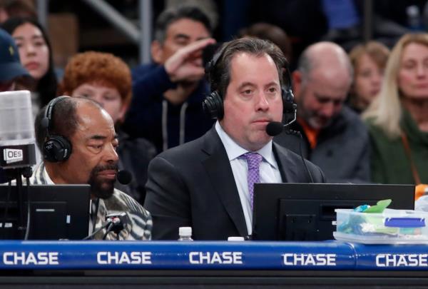 New York Knicks broadcasters Kenny Albert (R) and Walt Frazier work a game against the Dallas Mavericks at Madison Square Garden on Saturday, Dec. 3, 2022 