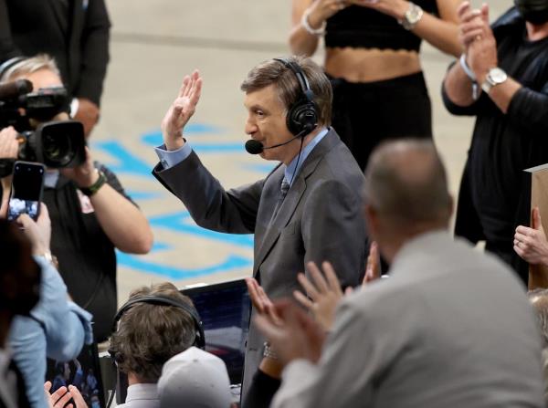 Marv Albert waves to cheering fans in the game between the Brooklyn Nets and the Milwaukee Bucks during game 5 of the Eastern Co<em></em>nference second round at Barclays Center on June 15, 2021