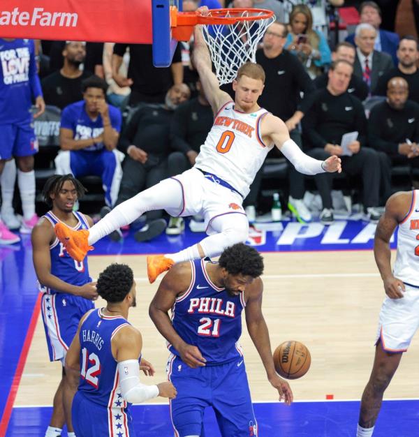 Do<em></em>nte DiVincenzo of the New York Knicks slams the ball over Joel Embiid #21 of the Philadelphia 76ers during the third quarter.