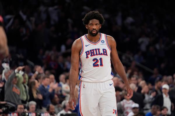 Philadelphia 76ers' Joel Embiid (21) reacts during the first half of Game 5 in an NBA basketball first-round playoff series against the New York Knicks, Tuesday, April 30, 2024, in New York. 