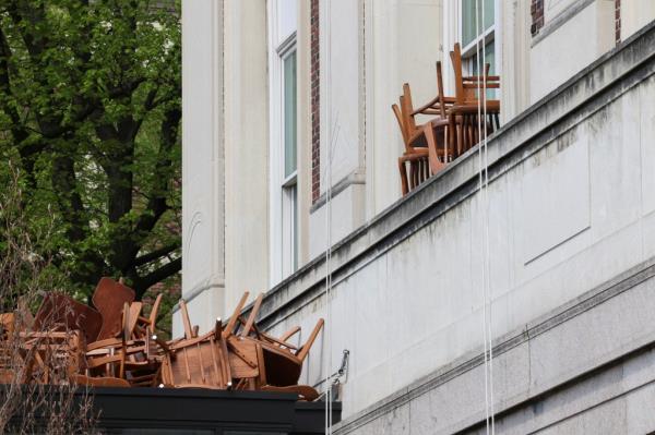 Police use a special vehicle to enter Hamilton Hall Tuesday night.