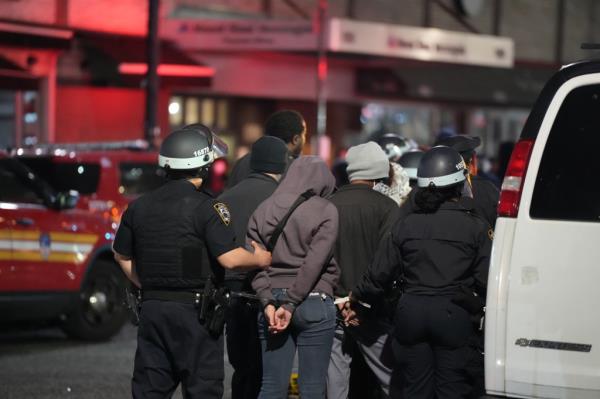 Student protestors are arrested by police and removed from the campus of Columbia University.