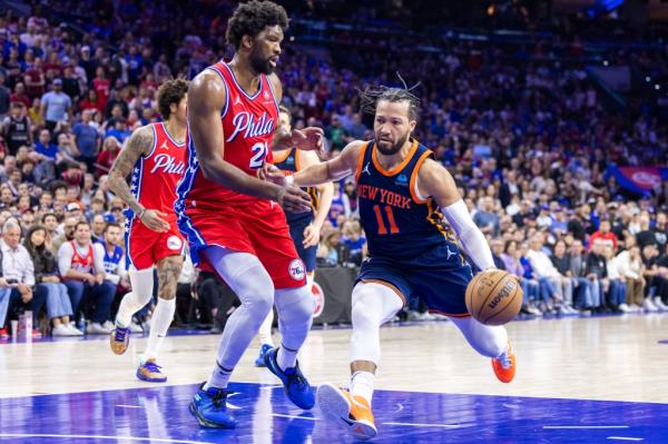 Knicks guard Jalen Brunson drives against Joel Embiid during Game 4.