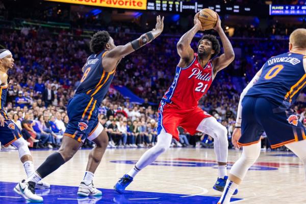 Joel Embiid #21 of the Philadelphia 76ers puts up a shot as OG Anunoby #8 of the New York Knicks defends in the second half. The New York Knicks defeat the Philadelphia 76ers 97-92 in game 4 of the Eastern Co<em></em>nference first round at the Wells Fargo Center, Sunday, April 28, 2024, in Philadelphia, PA.  