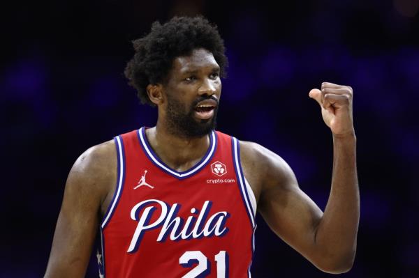 Joel Embiid #21 of the Philadelphia 76ers reacts during the fourth quarter against the New York Knicks during game four of the Eastern Co<em></em>nference First Round Playoffs at the Wells Fargo Center on April 28, 2024 in Philadelphia, Pennsylvania.  