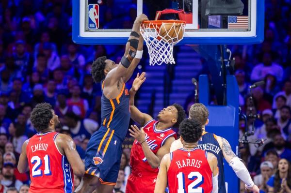 Knicks forward OG Anunoby jams on Philadelphia's Kyle Lowry during Game 4 of their first-round NBA playoff matchup on Sunday.