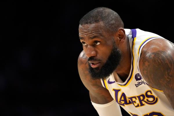 Los Angeles Lakers forward LeBron James takes a rest on the court during the first half in Game 4 of an NBA basketball first-round playoff series against the Denver Nuggets Saturday, April 27, 2024, in Los Angeles.  