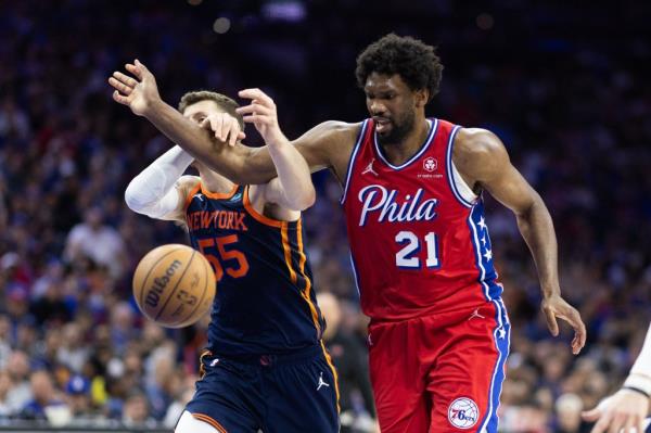 Joel Embiid of the Philadelphia 76ers losing co<em></em>ntrol of the ball during a game against the New York Knicks in the 2024 NBA playoffs.